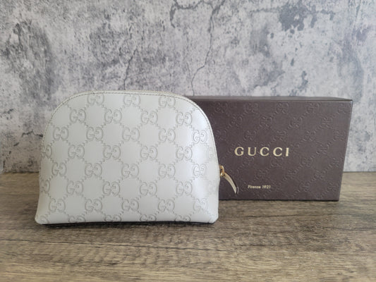 Gucci Leather Embossed GG Cosmetic Bag