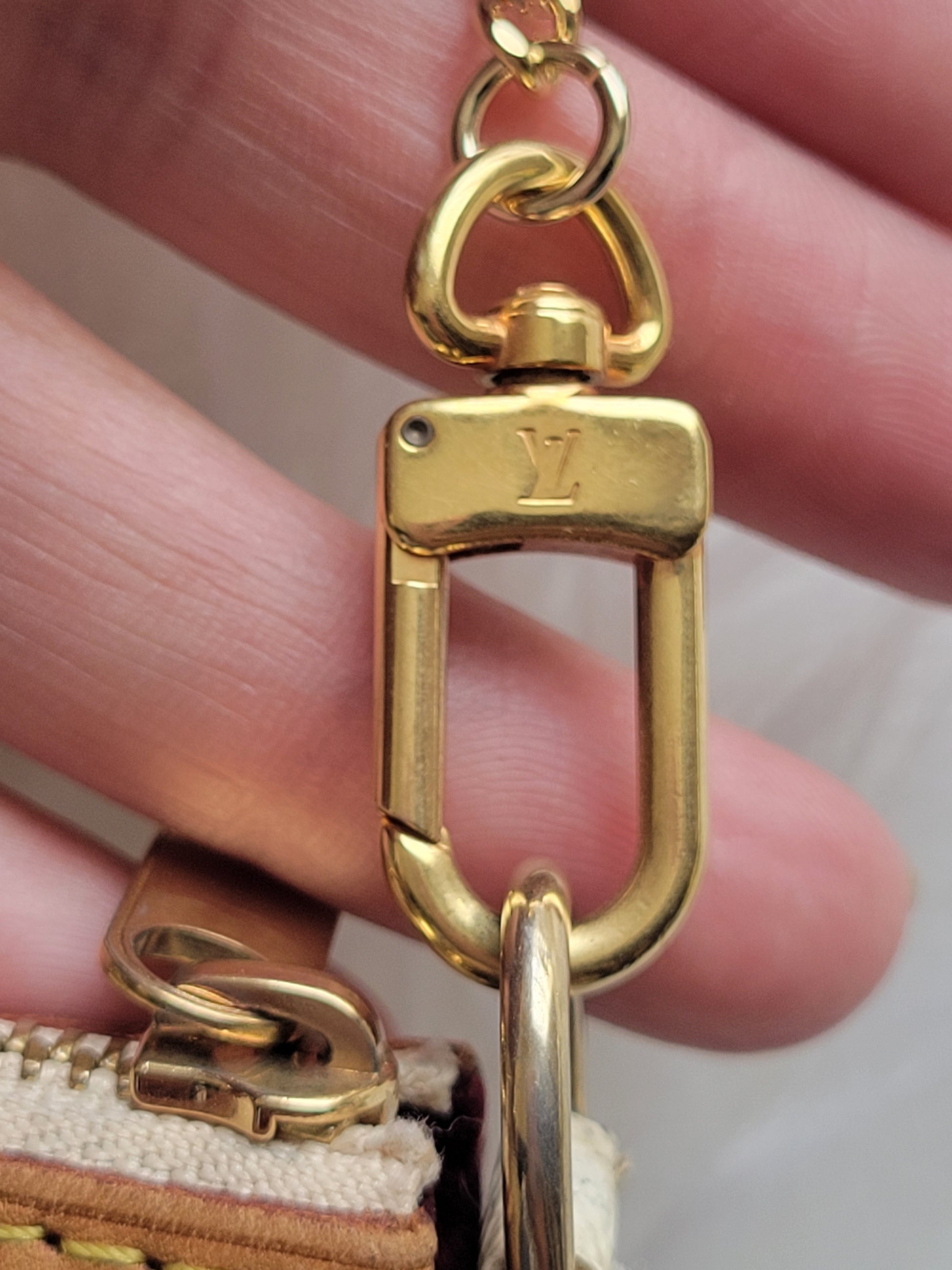 Louis Vuitton leather lion keychain